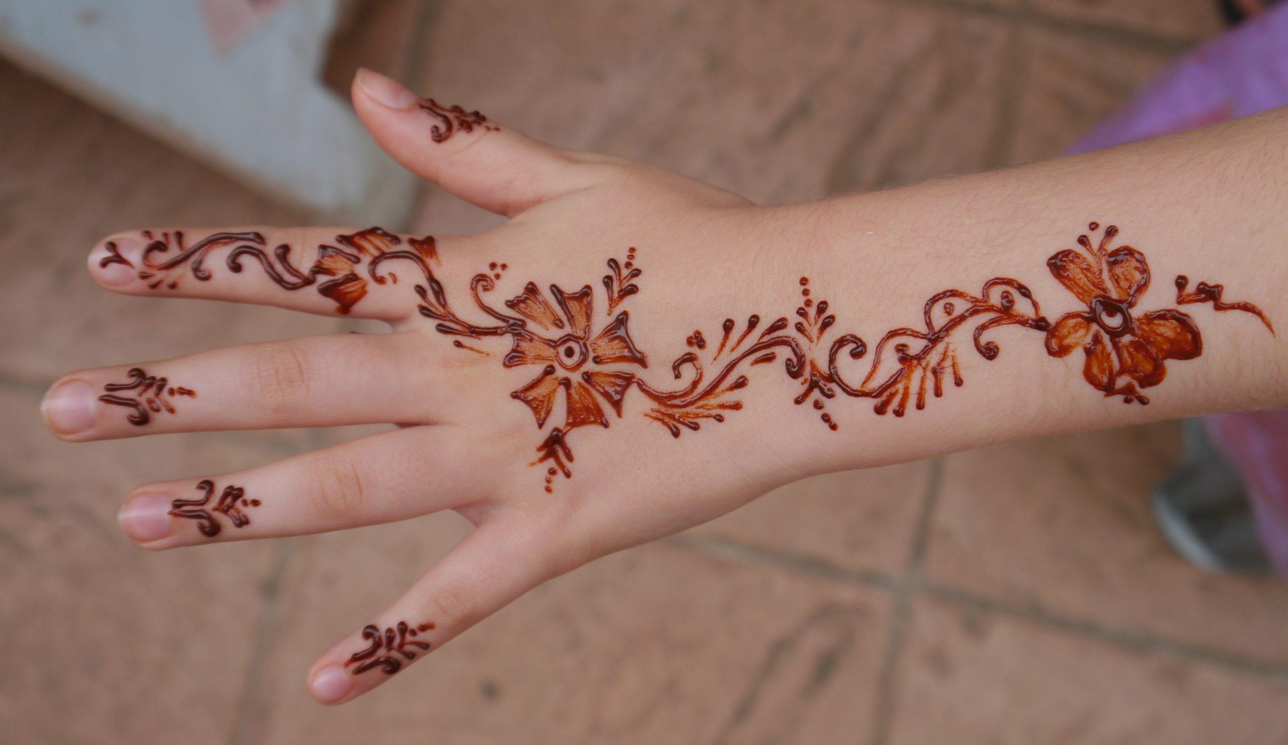 Cultural significance of henna girl hand